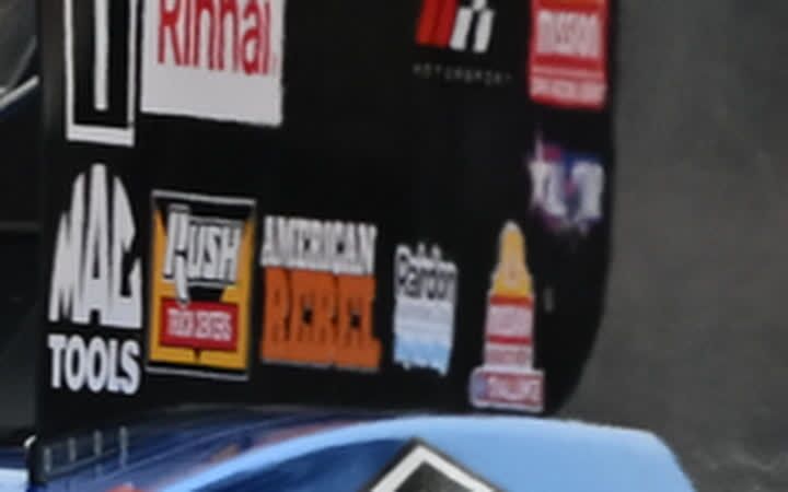 Close crop of the Rairdon decal on Hagan's rear wing side panel