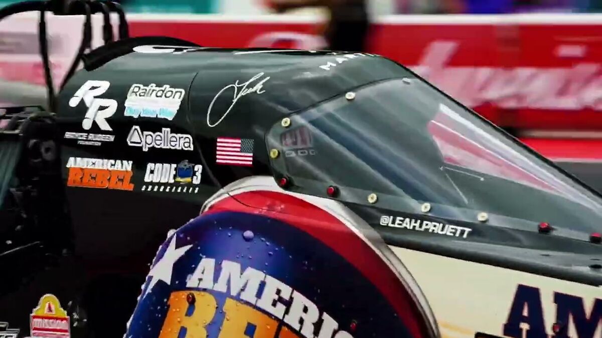 Leah Pruett's dragster cowl with her name on the canopy