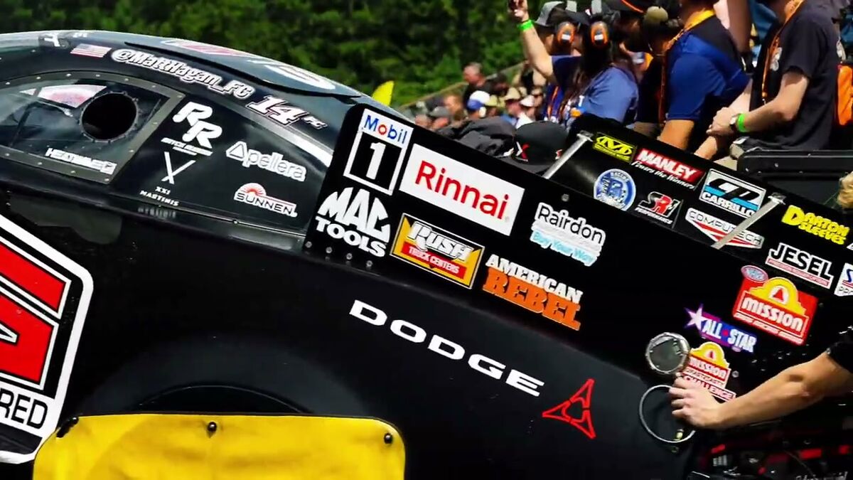 The Rairdon decal among the sponsor decals on Matt Hagan's Funny Car body